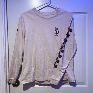 Vans Medium sized long sleeve shirt, tan with checkerboard design on sleeves.